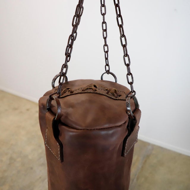We offer this Leather Gym Punching Boxing Heavy Bag. This piece is made of vintage leather and vintage chains following...