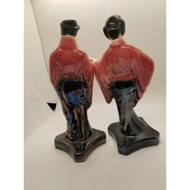 Midcentury Modern Asian figurines with Geisha and Man with Lusterware Glaze Pink and Black Stanforsware