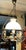 A striking pendant lamp in the Neo-Renaissance/Vintage style. Crafted from brass with decorative openwork elements and a...