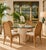 Charming vintage dining chairs featuring beautifully woven natural wicker over sturdy metal frames. Designed with tall...