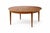 A classic g plan round teak extending dining table, dating from the mid-century period and showcasing the clean,...