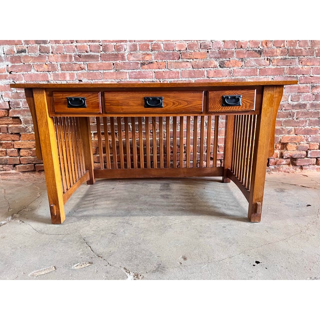 This solid oak Mission Arts & Crafts writing desk is beautiful construction. Solid wood and sturdy as well as stylish....