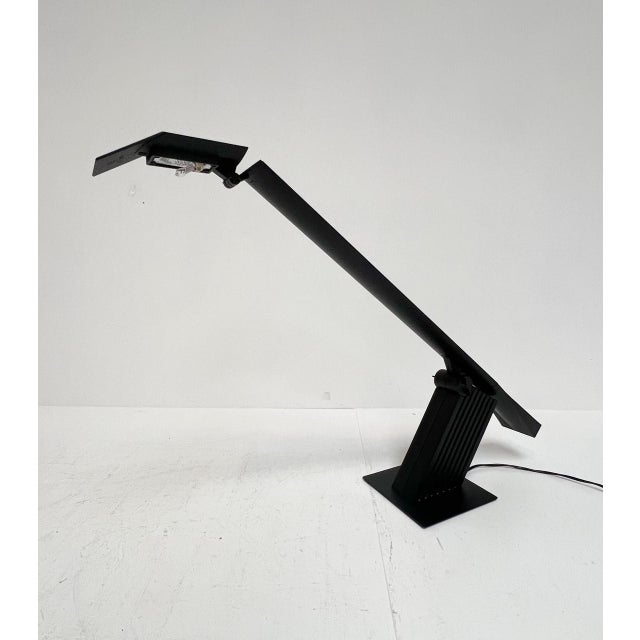 Striking and adjustable desk lamp with the name “Black Condor” by Hans von Klier for Bilumen from the 1980s. The lamp is...