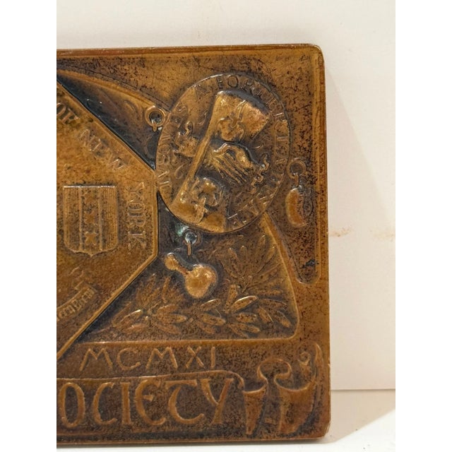 Bronze commemorative plaque issued by the Holland Society of New York for its January 1911 annual dinner, designed and...