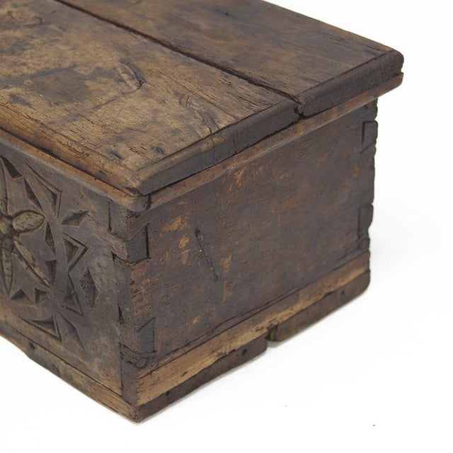 This antique Spanish chest from the 18th century is made of softwood and has a beautiful, weathered patina, with...