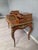 A luxurious and elegant piece of furniture for any office or study. The desk features a rich walnut colour with a leather...