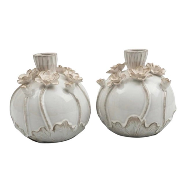 A charming pair of vintage-inspired Italian ceramic vases, expertly hand-crafted with a striking botanical motif. Each...
