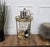 Beautiful and stylish vintage 1970s Italian two-tier round brass and glass bar cart with brass wheels. Very good condition...