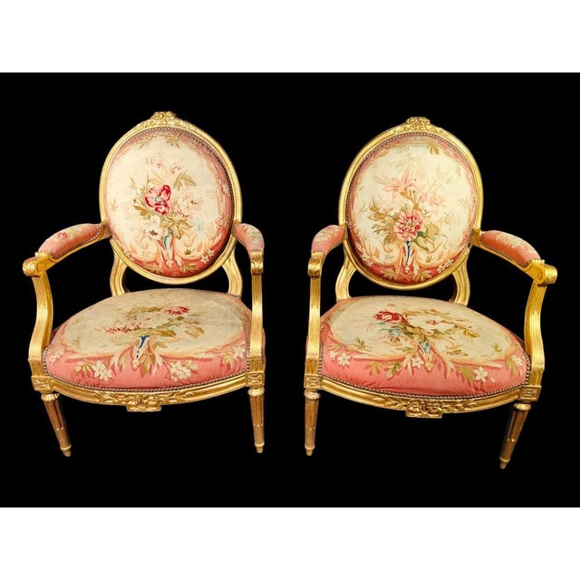 A pair of louis xvi giltwood seats,by claude chevigny, circa 1775-80. A pair of louis xvi giltwood seats, by claude...