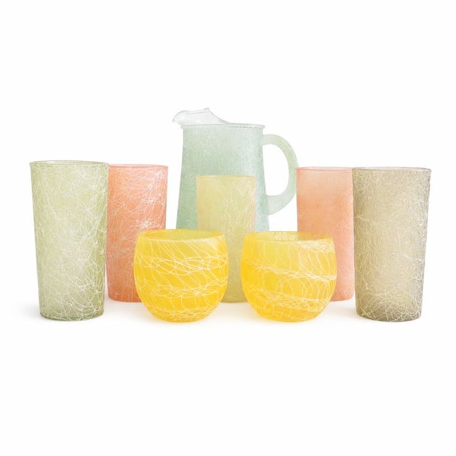 Fabulous 1950s/1960s string or rubberband glassware set consisting of a pale turquoise beverage pitcher plus 5 tall and 2...