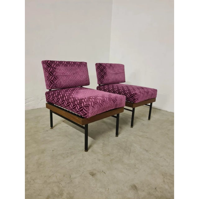 Pair of armchairs from the 60s Vintage armchairs made in Italy in the 60s. The armchairs have a solid enameled metal...