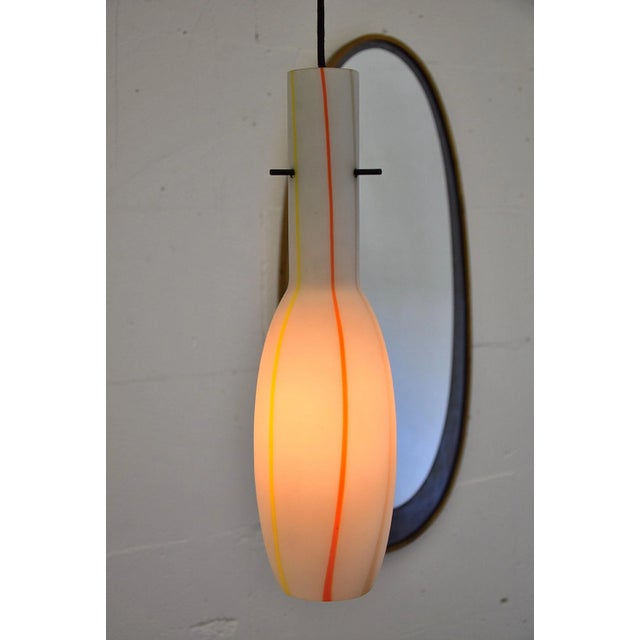 This is a set of two late 1950’s hand blown satin finished pendant lamps designed by Alessandro Pianon for Vistosi, Murano...