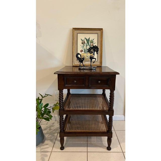 This is a stunning British Colonial-inspired tiered stand. A perfect blend of classic English craftsmanship and tropical...