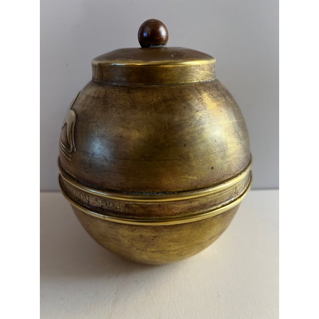 Marvelous brass tea caddy from Lipton Company, marked Lipton's Souvenir Tea Caddy, British Empire Exhibition 1924. Symbol...