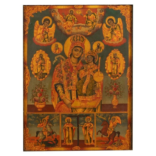 A large & fine antique early 19th century hand-painted & gilded Greek Orthodox icon, egg tempera on panel, circa 1800. The...