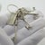 A vintage object composed of a decorative set of four life-size keys, handcrafted in Italy between the 1970s and 1980s in...