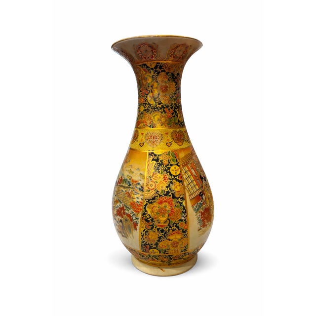 A dramatic large-scale Chinese export vase crafted in the Satsuma style, featuring richly detailed raised moriage enamel...