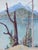 Scene of mountain reflections by Karl Albert Ufer (American, 20th century). Presented in a rustic wood frame. Signed "Karl...