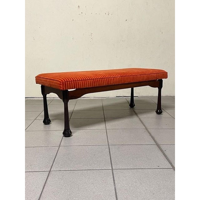 A 1960s-era upholstered bench, completely restored in Italy. Due to its features, it could also be considered an ottoman...