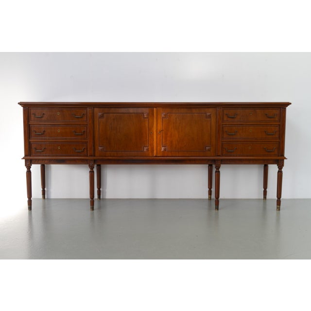 Danish Hepplewhite Mahogany Sideboard by Farre Møbelfabrik, 1970s. Elegant long and low sideboard in solid and veneered...