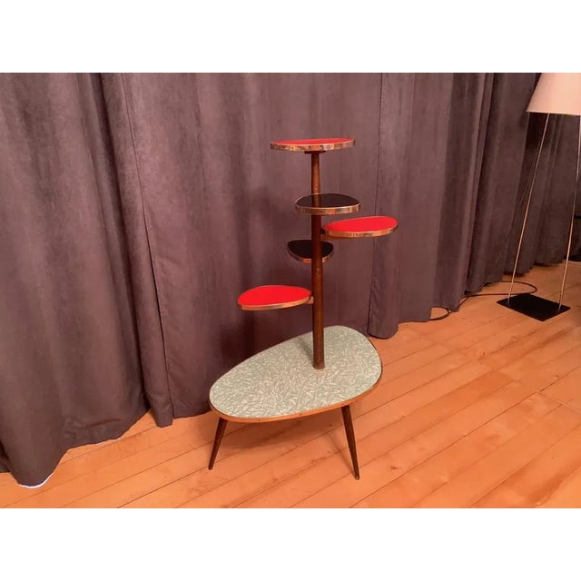 A large flower stand from the 1960s. In original and very good condition. Extremely attractive and cheerful style. The...