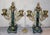 Circa 1890's SELSI French green marble clock with gilded accoutrements and original matching garnitures. Features original...