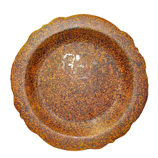 This multi-layer display plate boasts a striking fusion of colors and textures, creating a captivating piece that adds...