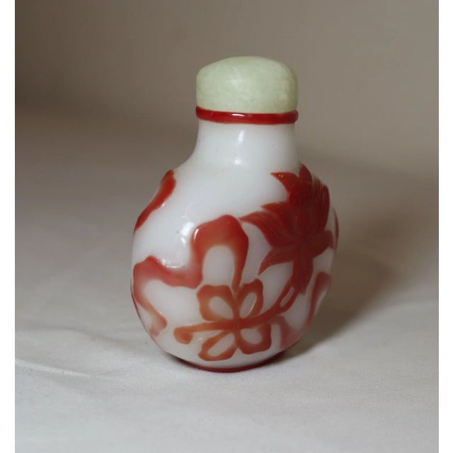 Up for is a lovely antique handmade 19th century Chinese peking glass and jade snuff bottle. This gorgeous example is made...