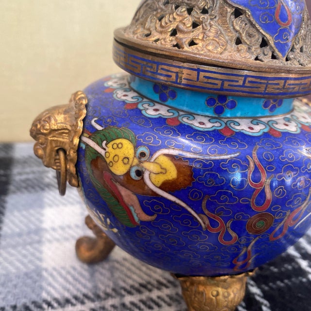 A beautiful blue hand painted cloisonné. This Asian piece is perfect for the interior designer or the enthusiast!