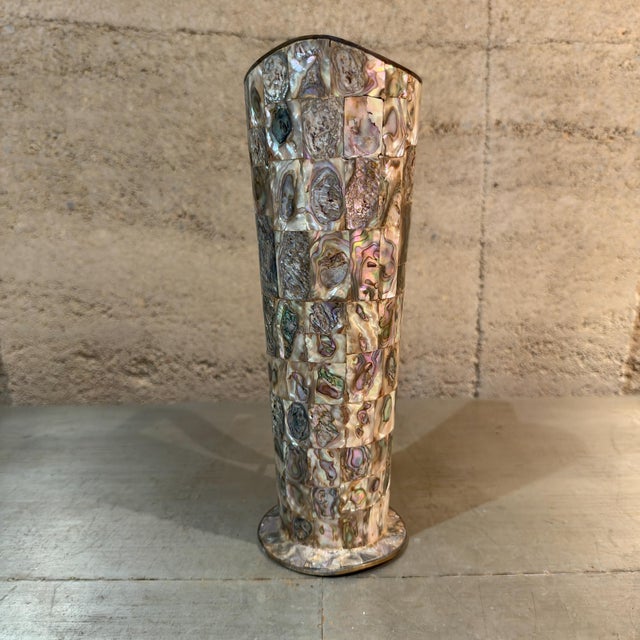 For your consideration, a mid-century vintage Mexican brass and inlaid abalone shell pitcher, often attributed to or made...