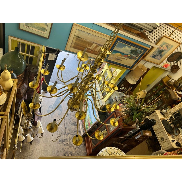 Large polished brass 21 arm hanging chandelier. I also have 2 smaller matching 10 arm chandelier sold separately.