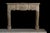 This limestone mantel is one of twelve fireplace mantels that we've recently acquired from a chateau-like mansion in...