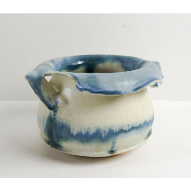 Hand thrown pot with matte teal and white glaze by Linda Thompson, circa 1990's. Folded edge with torn effect, artist...