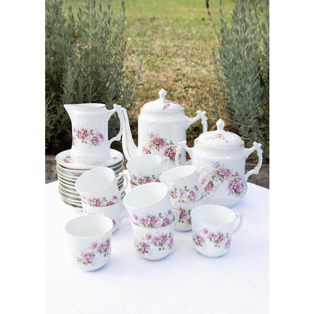Antique French porcelain coffee set, possibly Limoges, Belle Époque style, from around 1880 to 1910. Transfer-printed...