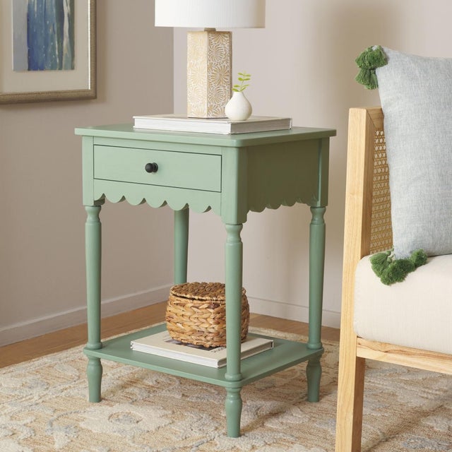 Bring subtle elegance and functionality into your home with the Haven One Top Drawer Accent Table in a beautiful sage...