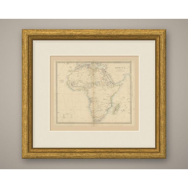 An original antique map of africa, a steel engraving colored by hand in outline, with a pale blue wash along the coasts....