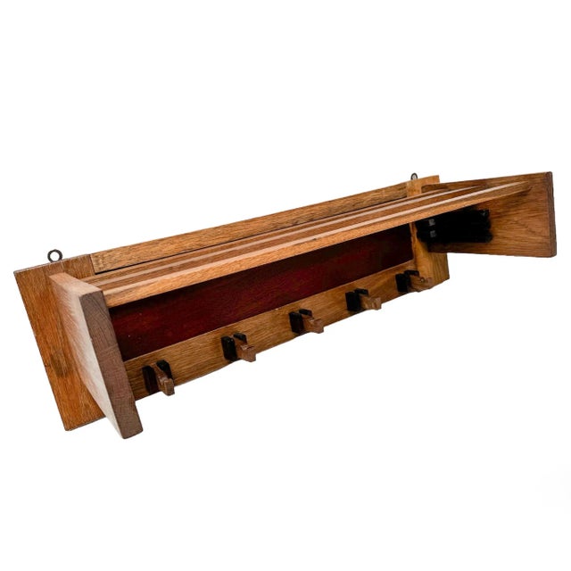 Stunning and rare Art Deco Modernist coat rack. Striking Dutch design from the 1920s. Solid oak frame with original padouk...