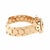 Retro 18K rose gold buckle bracelet with a honeycomb pattern. Measurements: Width: 23.3 mm (at the buckle) - 13.8 mm...