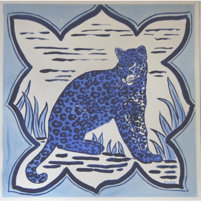 A royal blue leopard surrounded by a Delft tile border pattern, in traditional Delft style landscape with botanical...
