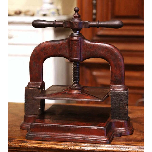 This antique paper binding press was forged in France, circa 1860. The Classic "Presse a Relier" made of solid iron is...