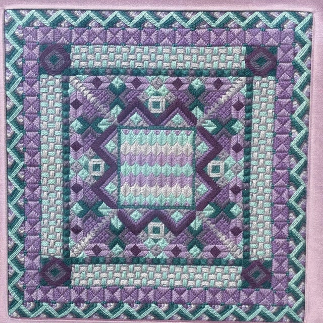 A unique vintage geometric yarn artwork under glass with velvet matting and chrome frame! Ships quickly via Fedex Home...