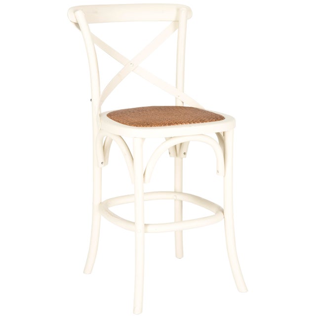 With it's willowy frame and iconic cross-back inspired by Michael Thonet’s classic bistro chair, the counter stool by is...