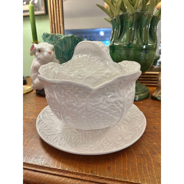 This is a vintage Portuguese majolica cabbage ware tureen with matching underplate, beautifully molded in a naturalistic...