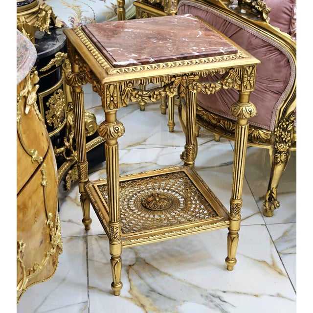 This French style side table is a luxurious statement piece that combines timeless European elegance with sophisticated...