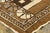 Hand-knotted in wool, this 5x8 contemporary French rug features a modern, cubist-inspired layout of swirling volutes,...