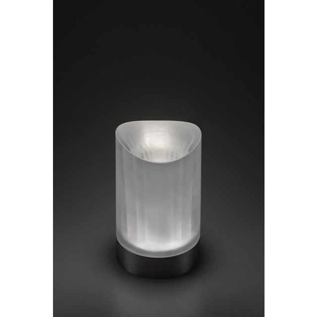 Designed by Federico Peri for Purho Murano, Haute is a rechargeable table lamp of restrained dimensions (diameter 76 x...