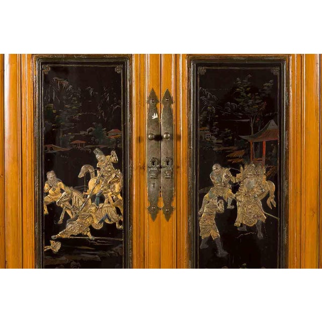 Chinese Early 20th Century Lacquered Armoire With Gilt Carved Warrior Motifs For Sale - Image 10 of 18