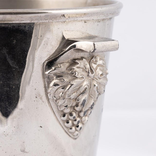 A superb 20th century champagne bucket / wine cooler. Featuring a tapered, smooth body along with enamelled lettering...