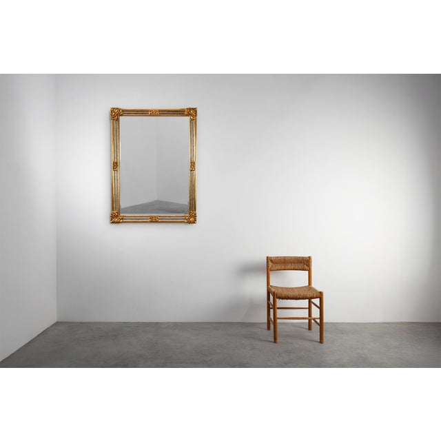 A refined example of Belgian decorative design from the 1980s, this gilt mirror by Deknudt combines mid‑century clarity...