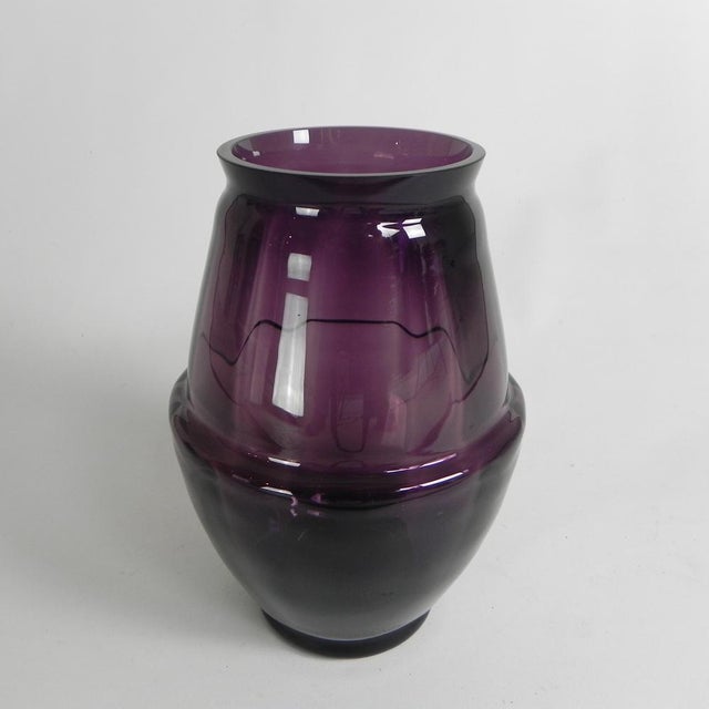 Purple vase made of mouth-blown glass with glass of varying thicknesses creating a beautiful interplay of lines Height: 29...